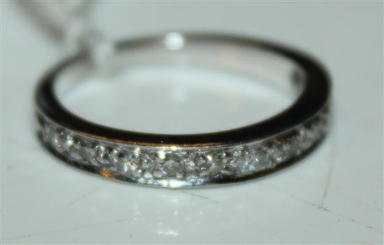 Gold and diamond half eternity ring